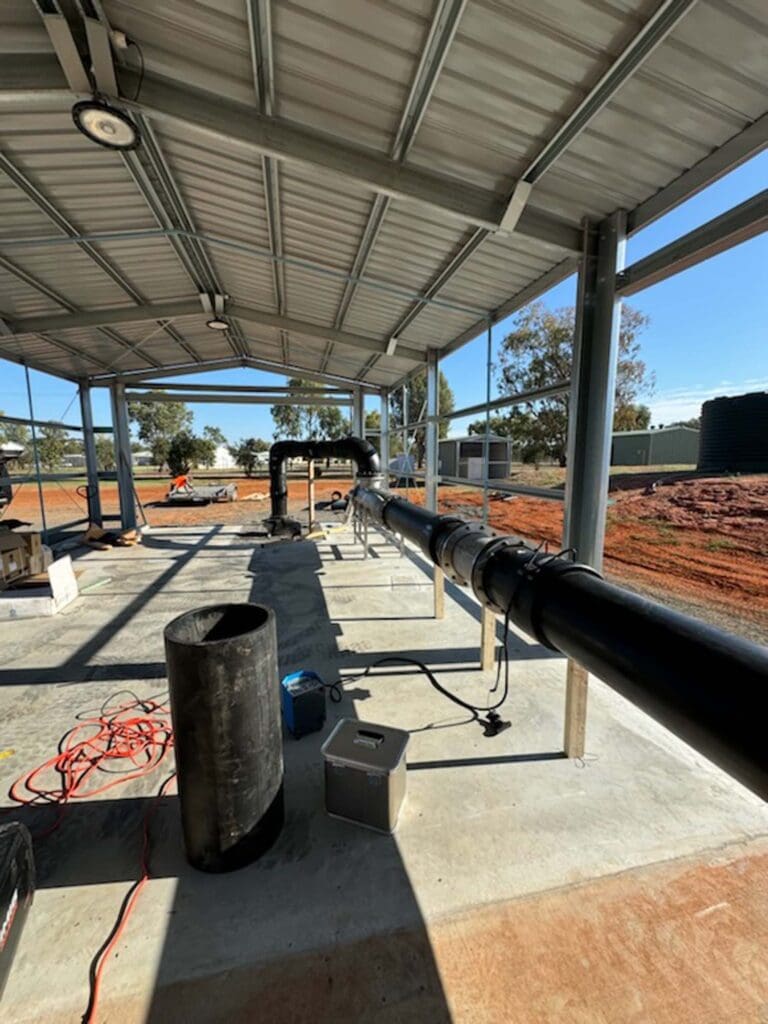 CNC QLD technician installing a UV system for wastewater treatment.