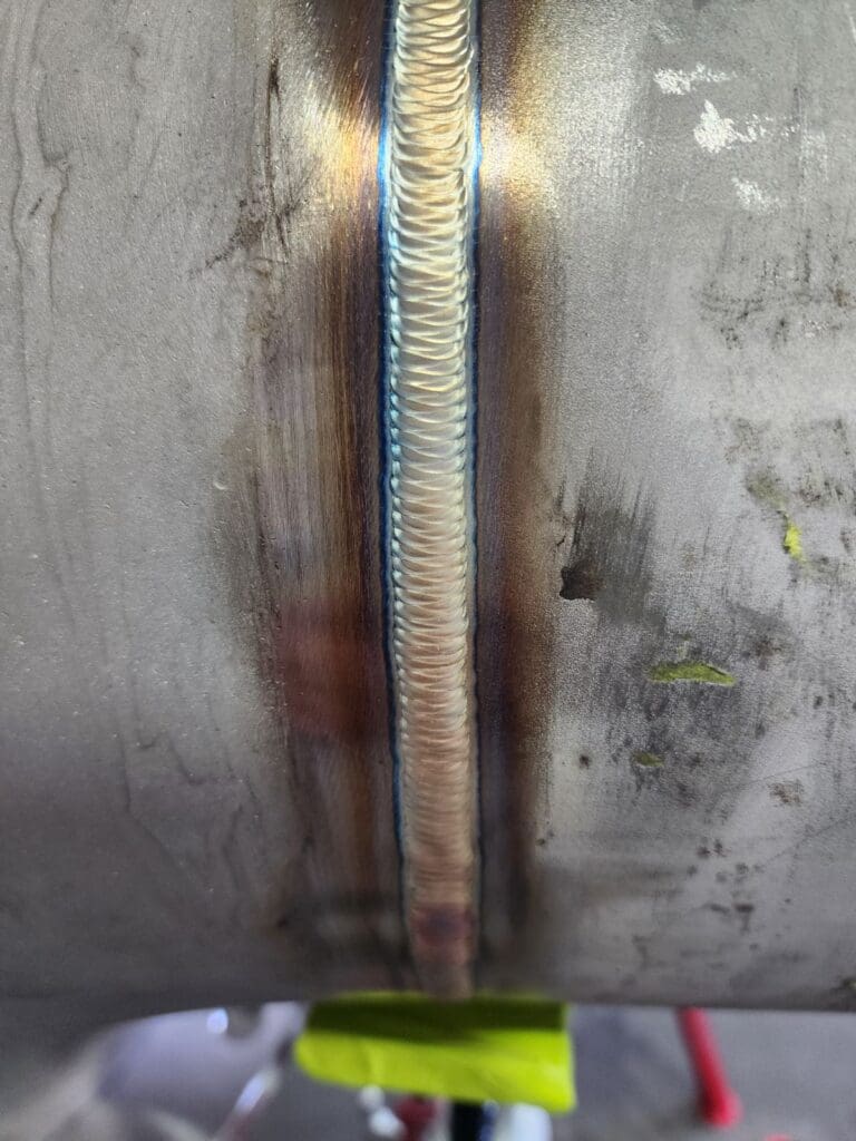 CNC QLD team fabricating custom components for wastewater systems.